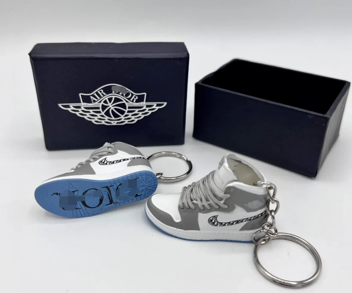 A Pair Of DIOR AIR Jordan 3D Mini Sneaker Keychain Perfect for Nike and Dior Enthusiasts/ With Shoe Box