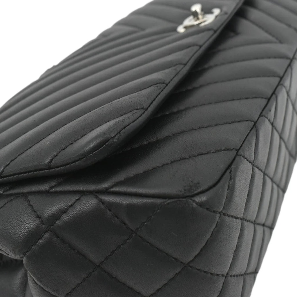 Pre-Owned CHANEL Surpique Chevron Medium Lambskin Leather Flap Crossbody Bag Black
