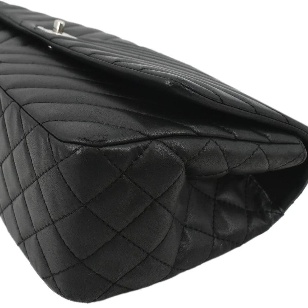 Pre-Owned CHANEL Surpique Chevron Medium Lambskin Leather Flap Crossbody Bag Black